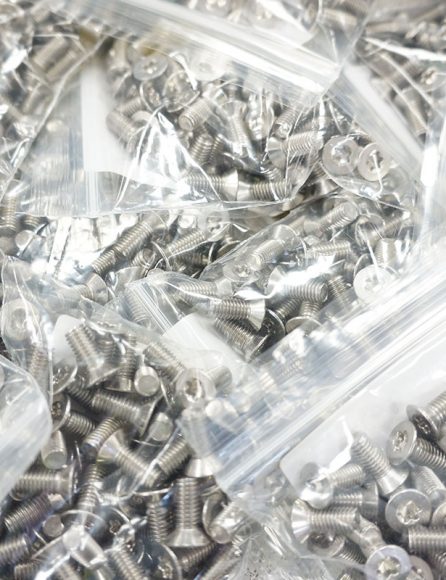 Mixed steel fasteners kitted in a clear bag.